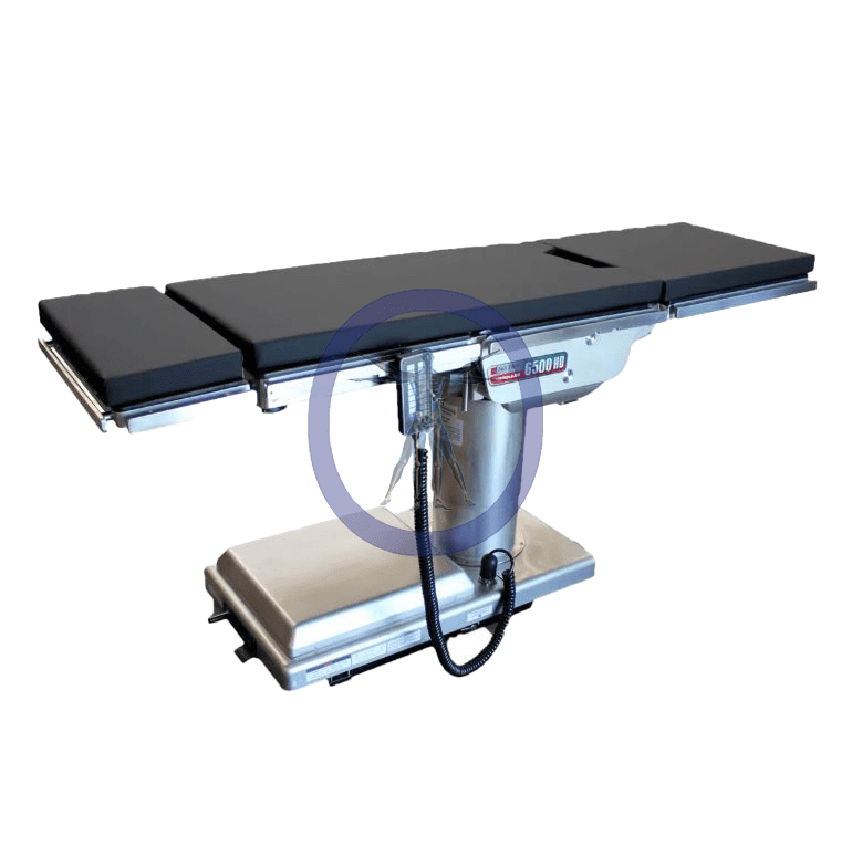 A medical operating table with a black top.